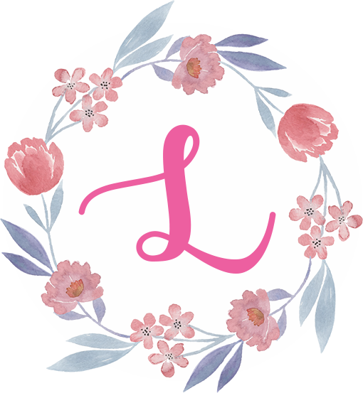 Circular floral border with a script L in the middle